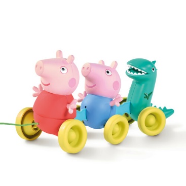 A toy pig and dinosaur
Description automatically generated