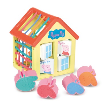 A toy house with a building and pieces of toys
Description automatically generated