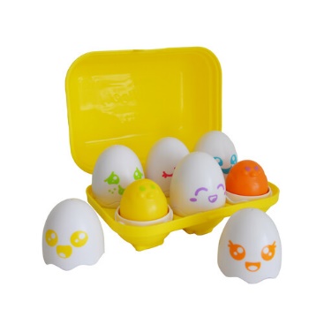 A yellow container with plastic eggs and a yellow container with white and orange eggs
Description automatically generated
